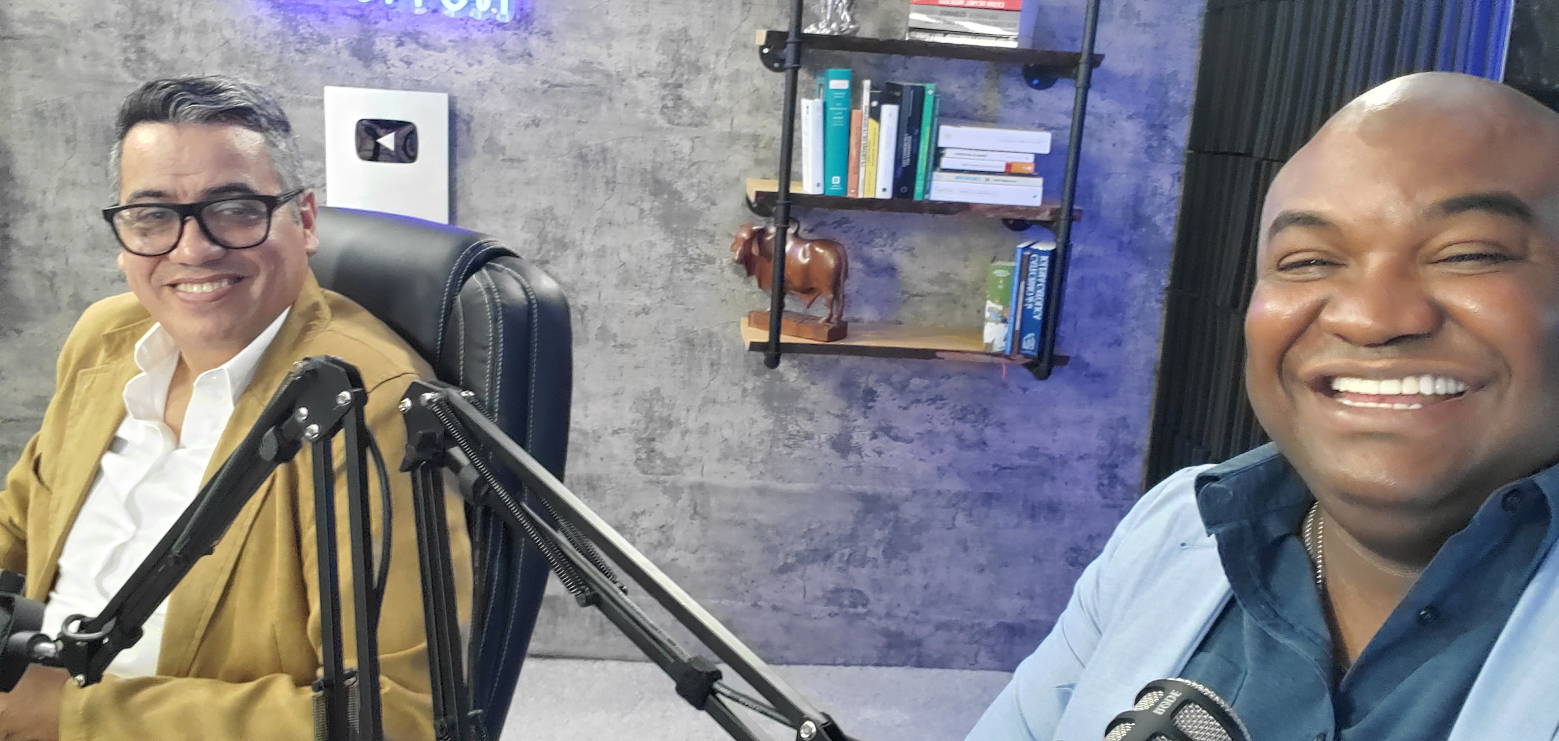 Felix Escobar with Manuel Milan&eacute;s at a professional podcast studio